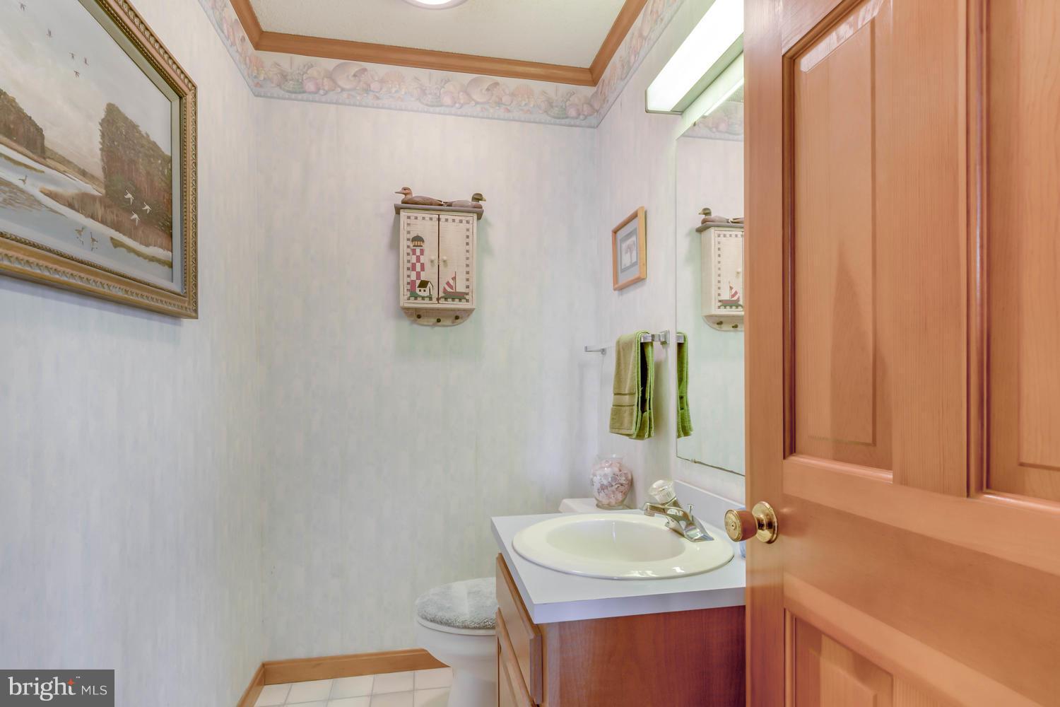 806 Seabreeze Road Cambridge, MD 21613 - Photo 26 of 41 Powder room on first floor.