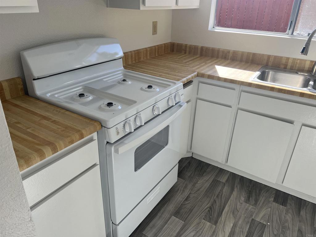 4537 Beverly Glen Drive Oceanside, CA 92056 - Photo 21 of 30 a utility room with dryer and washer