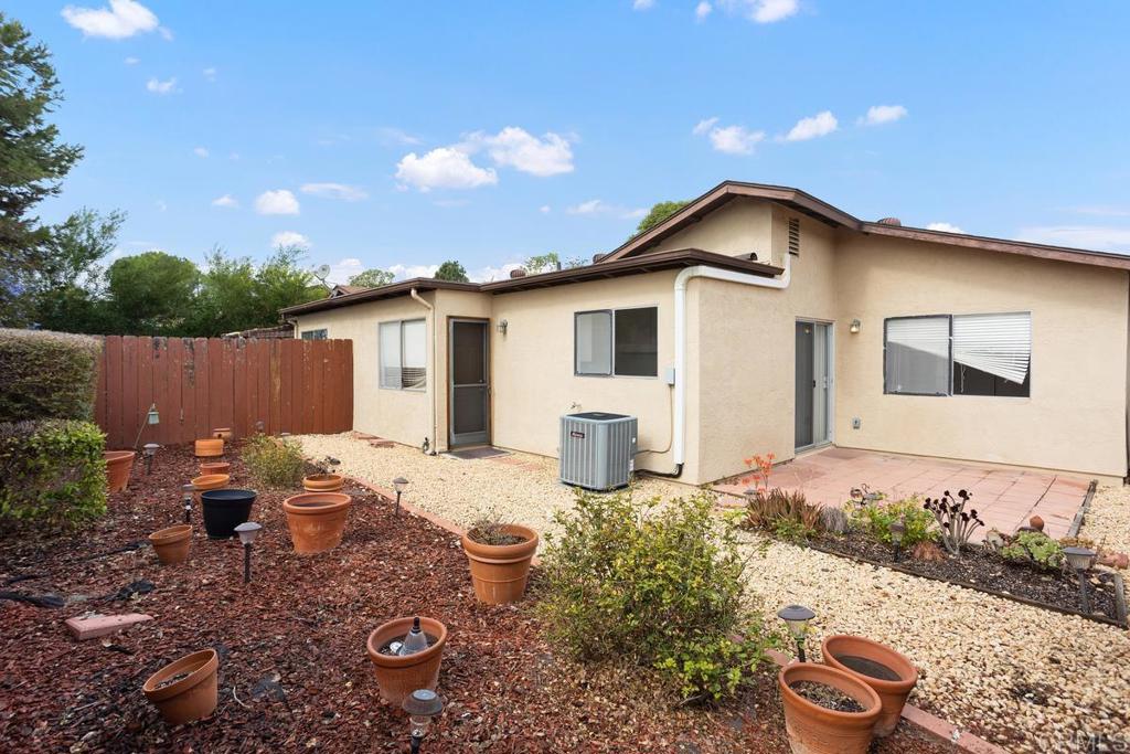 4537 Beverly Glen Drive Oceanside, CA 92056 - Photo 29 of 30 a front view of a house with patio