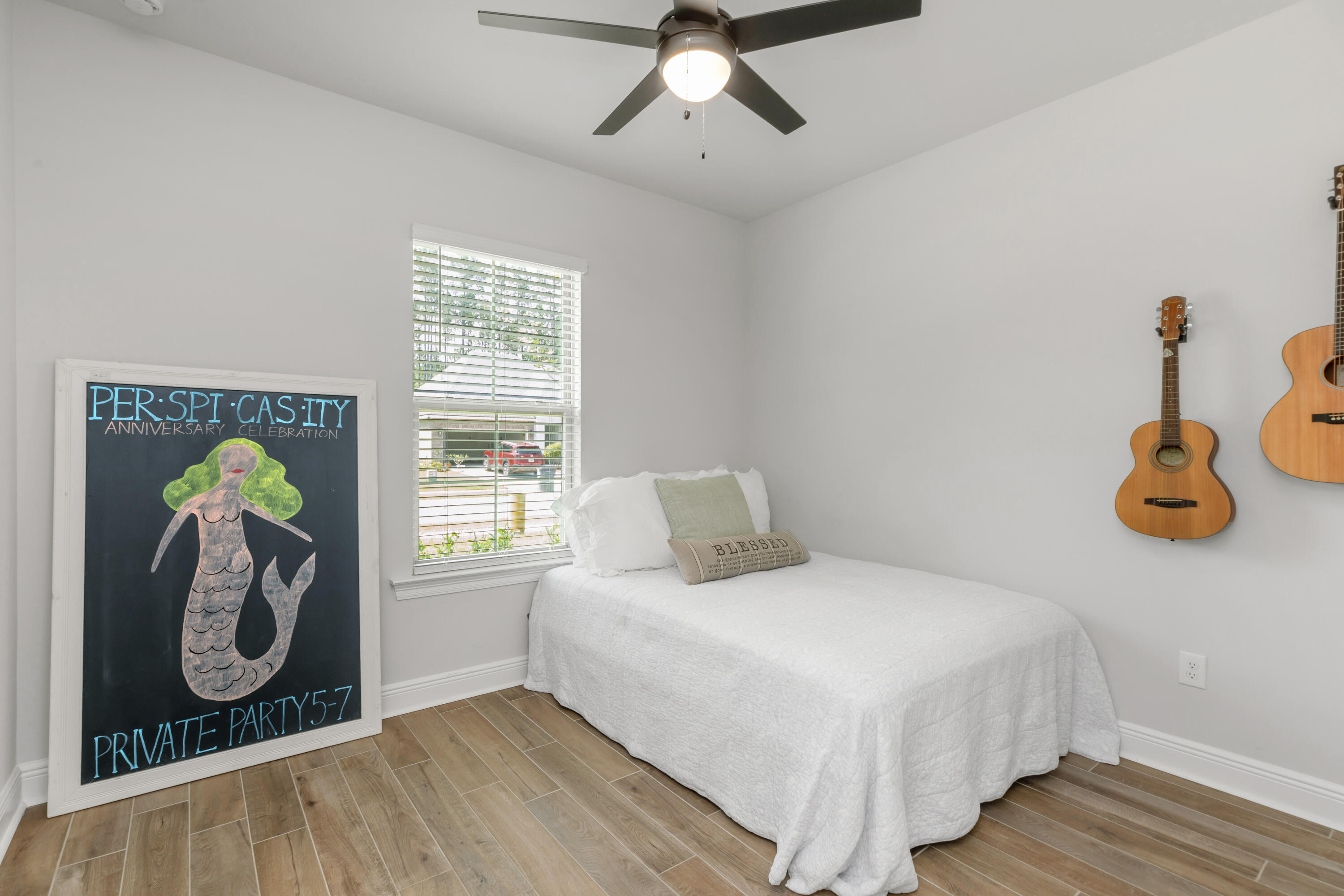 27 Cozy Cove Freeport, FL 32439 - Photo 23 of 80 a bedroom with a bed and a window