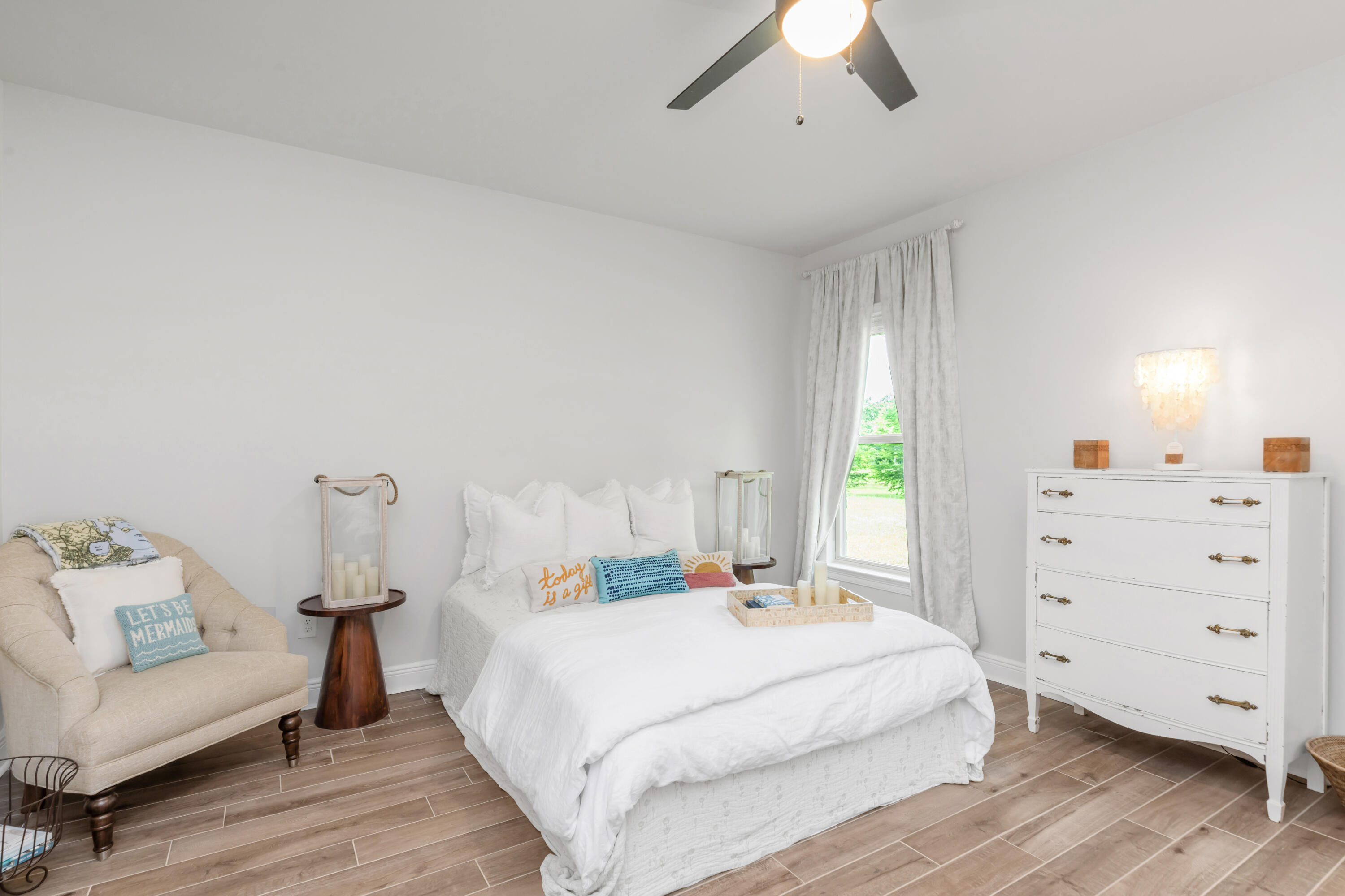 27 Cozy Cove Freeport, FL 32439 - Photo 31 of 80 a bedroom with a bed and a dresser