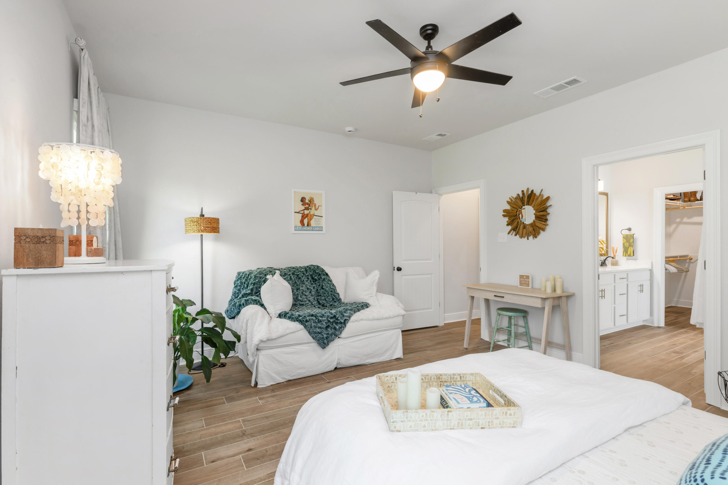 27 Cozy Cove Freeport, FL 32439 - Photo 34 of 80 a living room with furniture and a chandelier