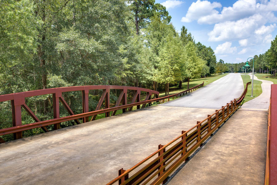 27 Cozy Cove Freeport, FL 32439 - Photo 57 of 80 a view of a swimming pool with a bench