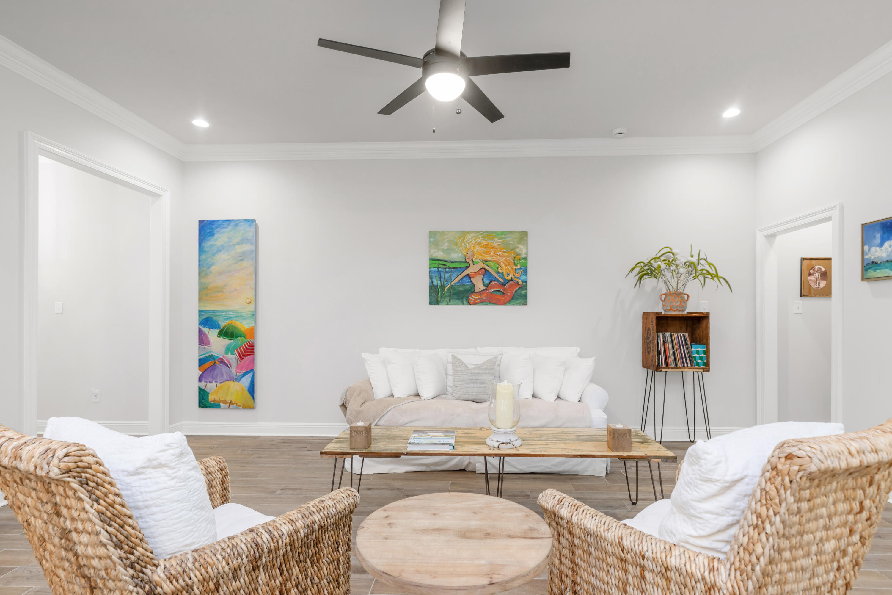 27 Cozy Cove Freeport, FL 32439 - Photo 7 of 80 a living room with furniture and painting on the wall