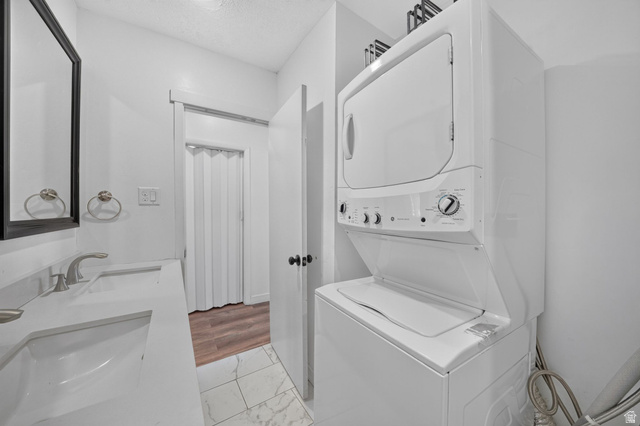 220 East Greenwood Avenue Midvale, UT 84047 - Photo 19 of 46 White stacked washer and dryer unit