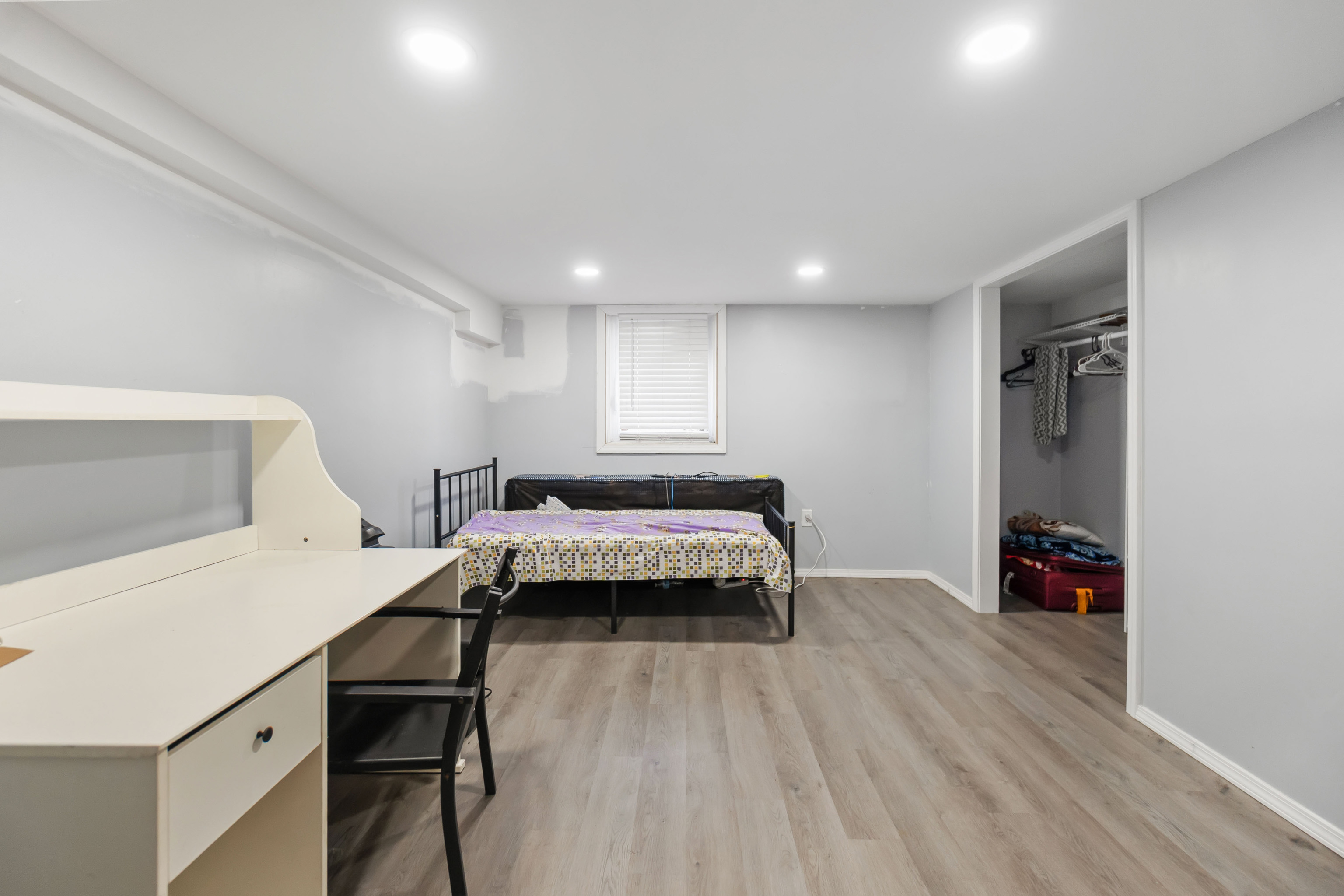 481 Savin Avenue West Haven, CT 06516 - Photo 14 of 21 a bed room with a bed and a chair