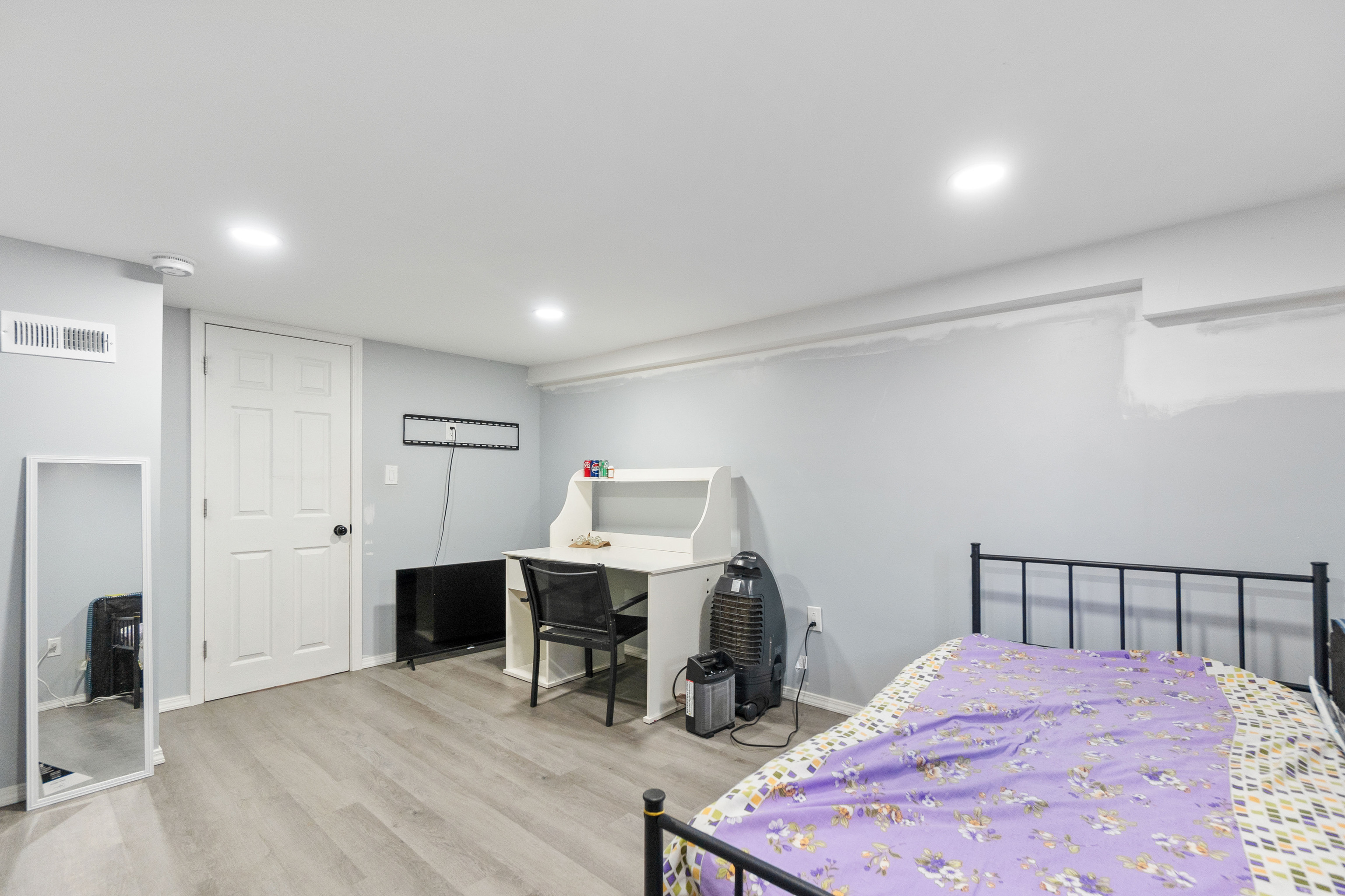 481 Savin Avenue West Haven, CT 06516 - Photo 16 of 21 a view of a workspace with furniture and wooden floor