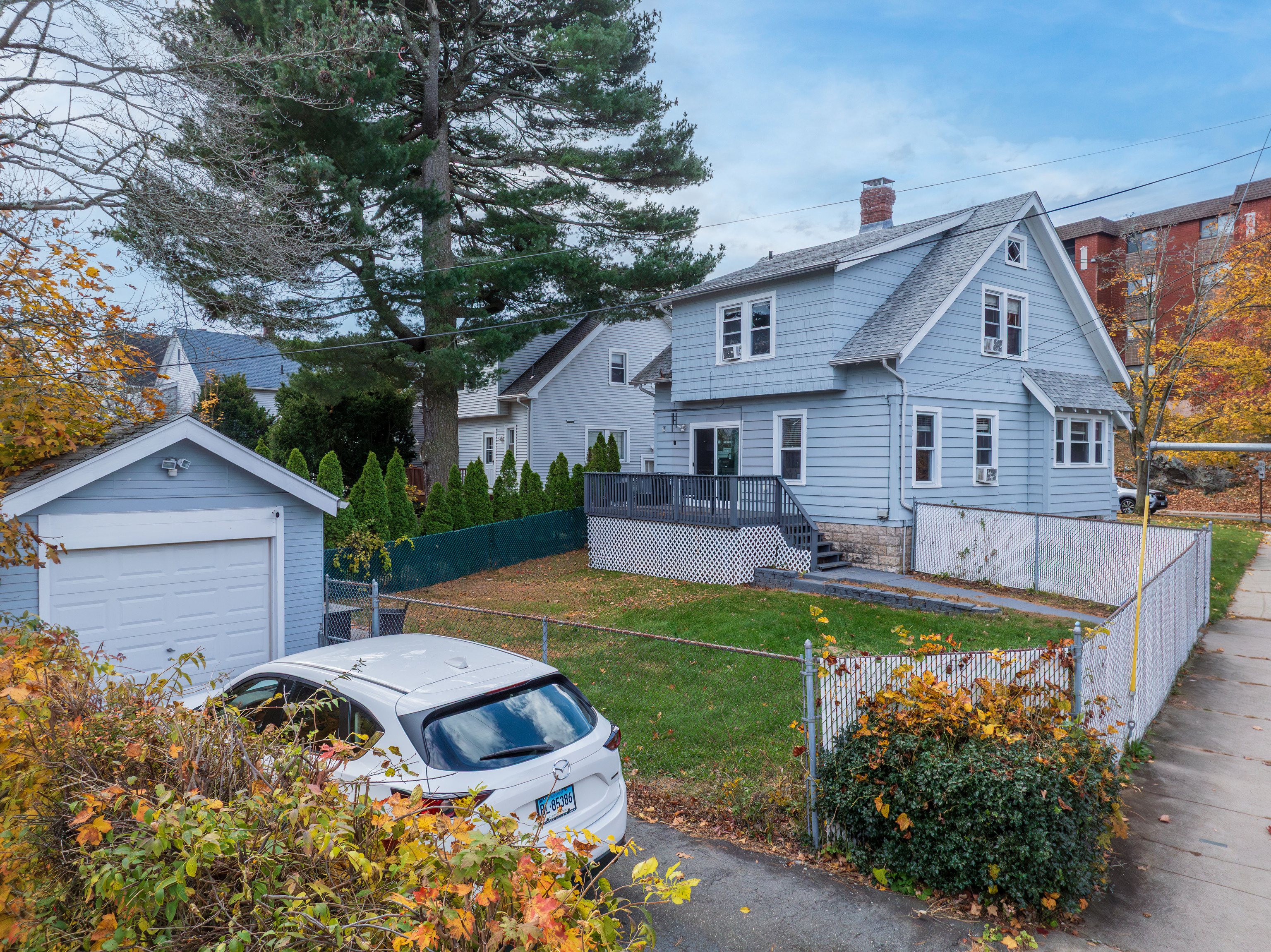 481 Savin Avenue West Haven, CT 06516 - Photo 18 of 21 a front view of a house with garden