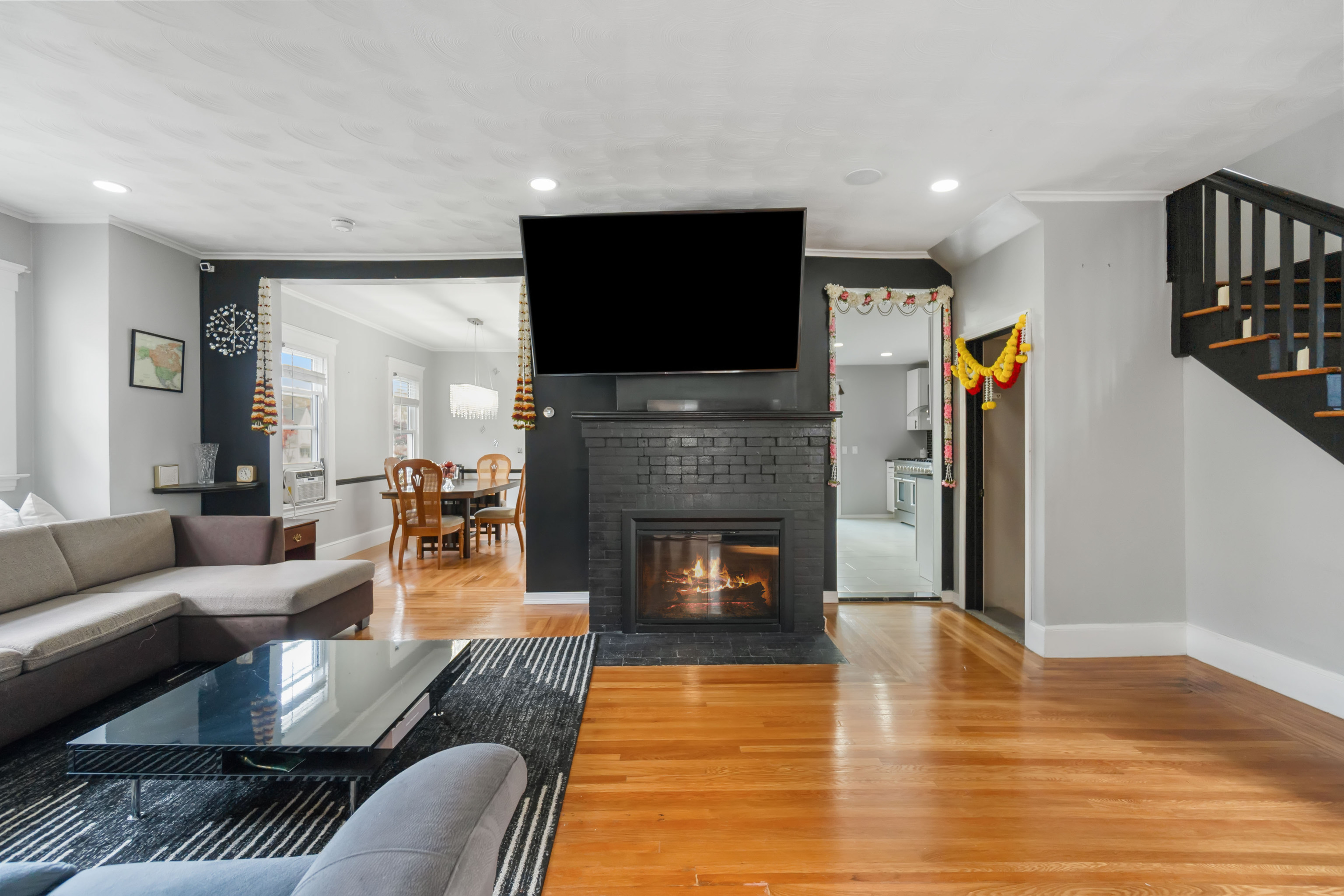 481 Savin Avenue West Haven, CT 06516 - Photo 5 of 21 a living room with furniture fireplace and flat screen tv