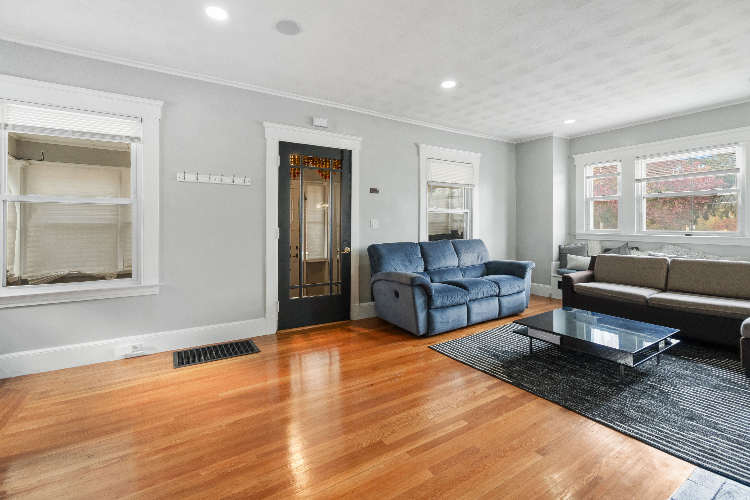 481 Savin Avenue West Haven, CT 06516 - Photo 6 of 21 a living room with furniture and windows