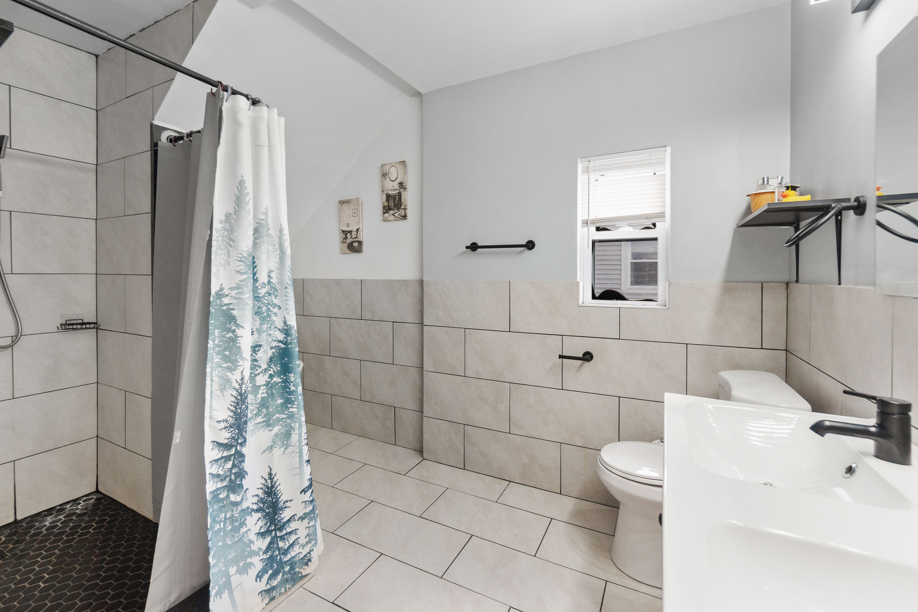 481 Savin Avenue West Haven, CT 06516 - Photo 8 of 21 a bathroom with a shower and a toilet