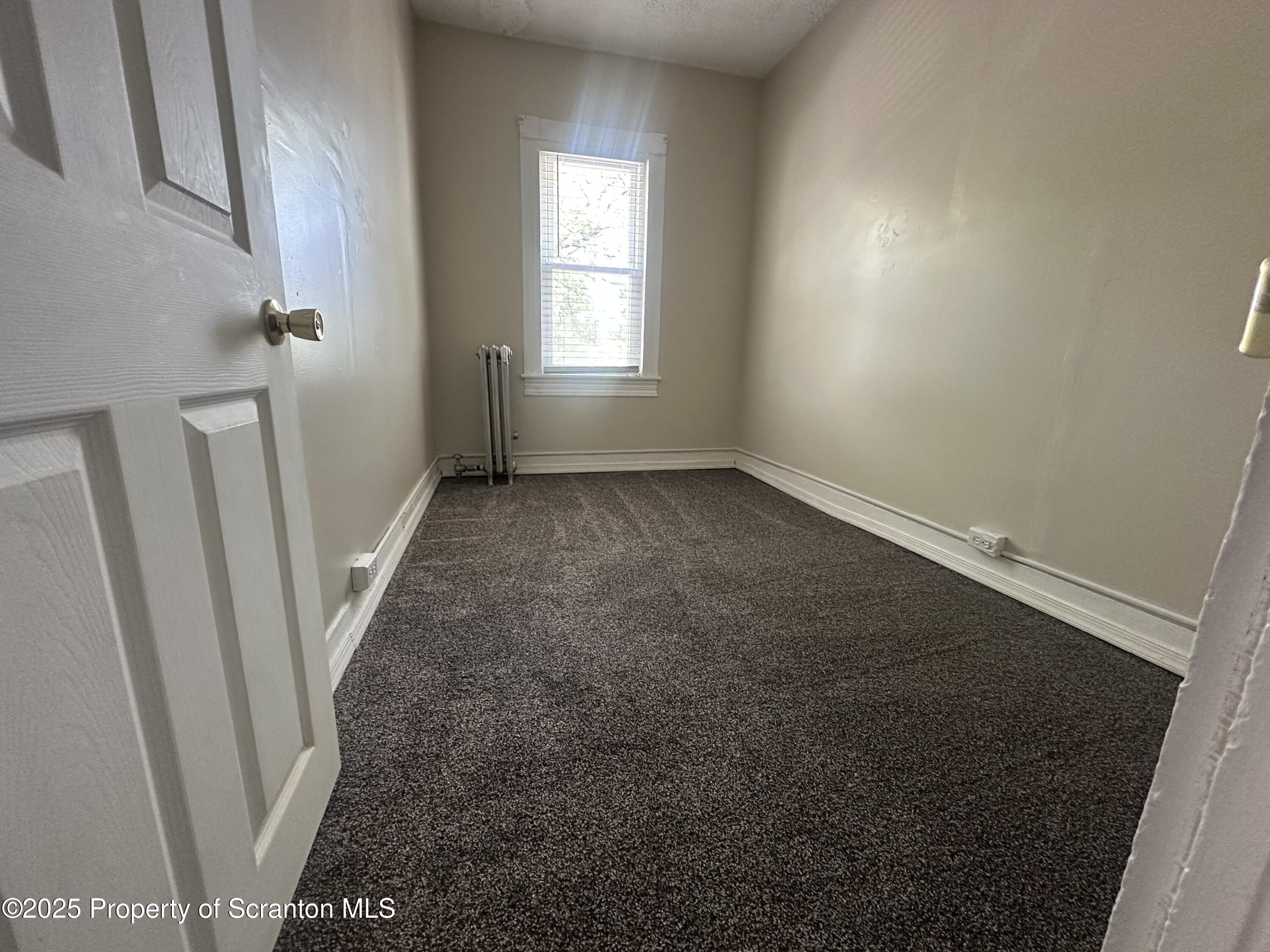 821 Maple Street Scranton, PA 18505 - Photo 12 of 21 an empty room with a window