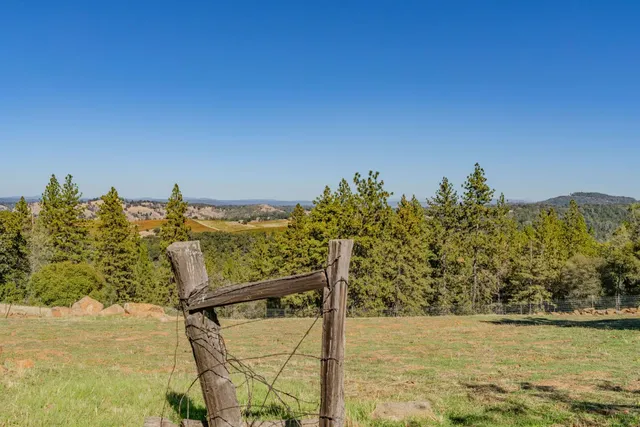 a view of a balcony with an ocean view