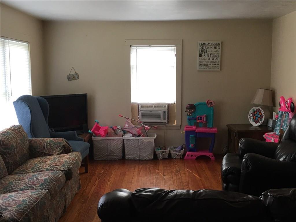 401 1/2 Ridge Avenue Butler, PA 16001 - Photo 8 of 15 Living Room in Upper Unit with original hardwood floors