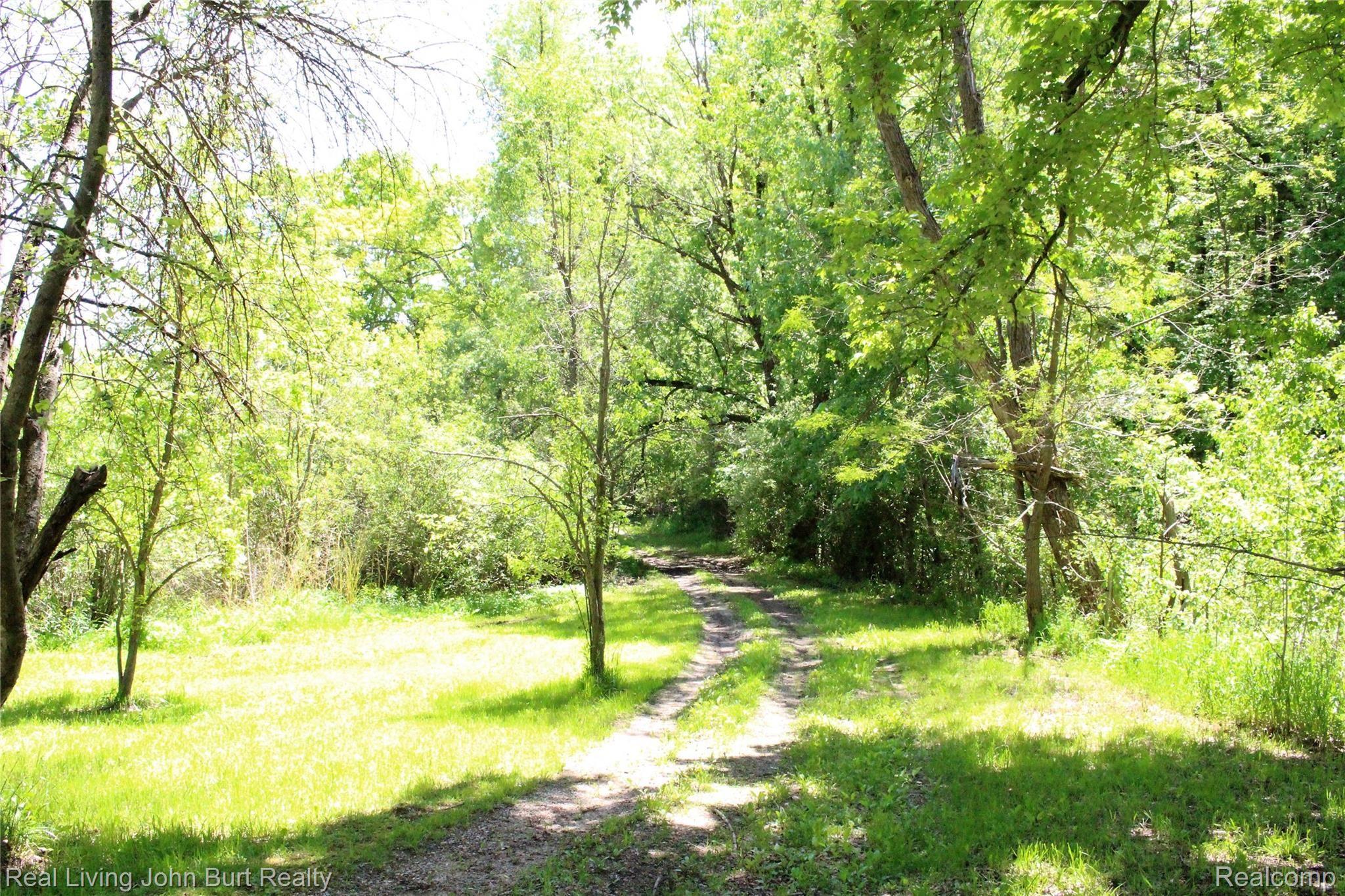 4965 Perryville Road Holly, MI 48442 - Photo 5 of 29 Drive to the barn
