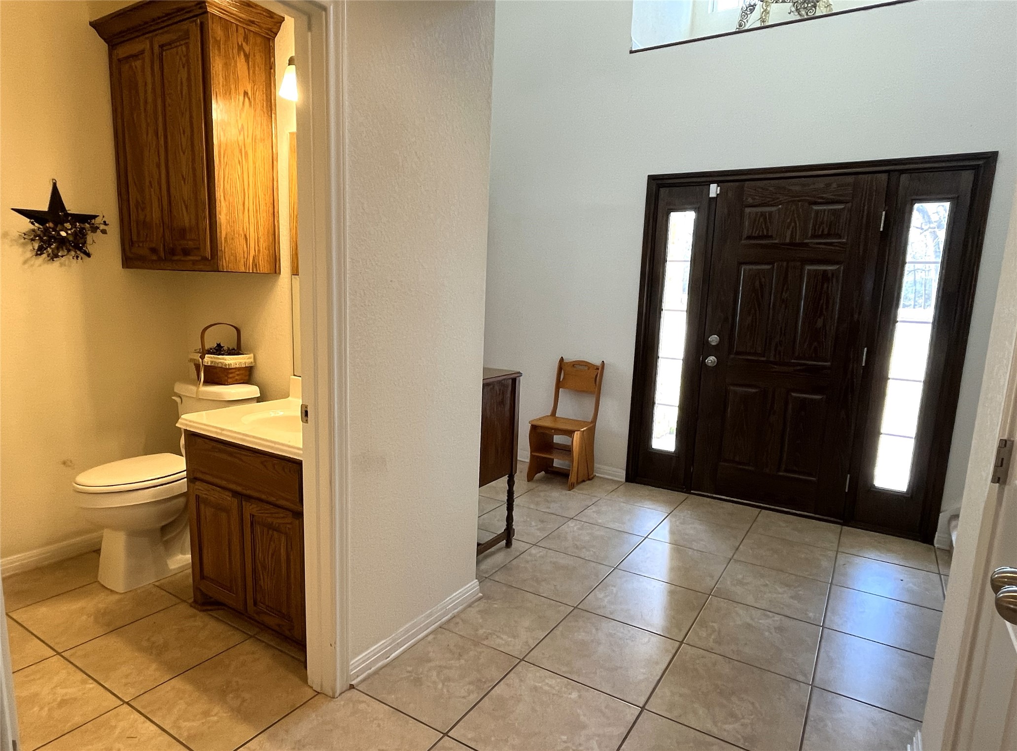 19846 Post Oak Loop Thornton, TX 76687 - Photo 22 of 44 a bathroom with a sink a toilet and mirror