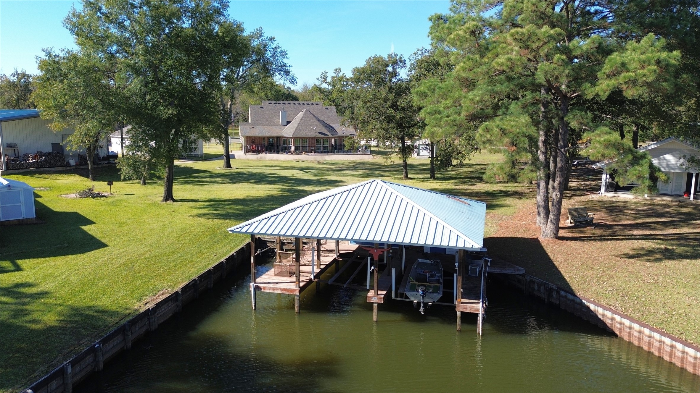 19846 Post Oak Loop Thornton, TX 76687 - Photo 3 of 44 a view of a house with swimming pool and sitting area