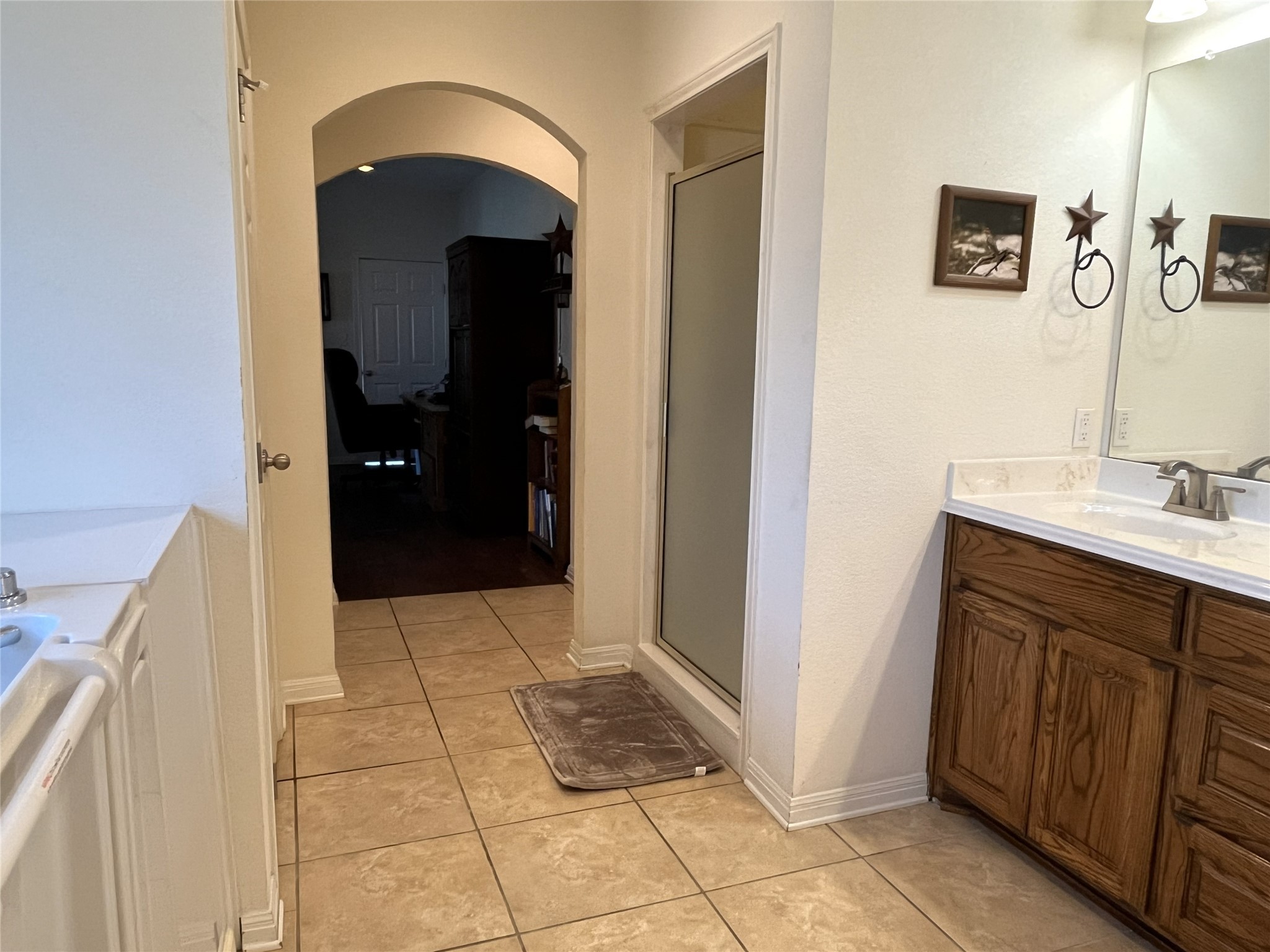 19846 Post Oak Loop Thornton, TX 76687 - Photo 32 of 44 a bathroom with a sink and a mirror