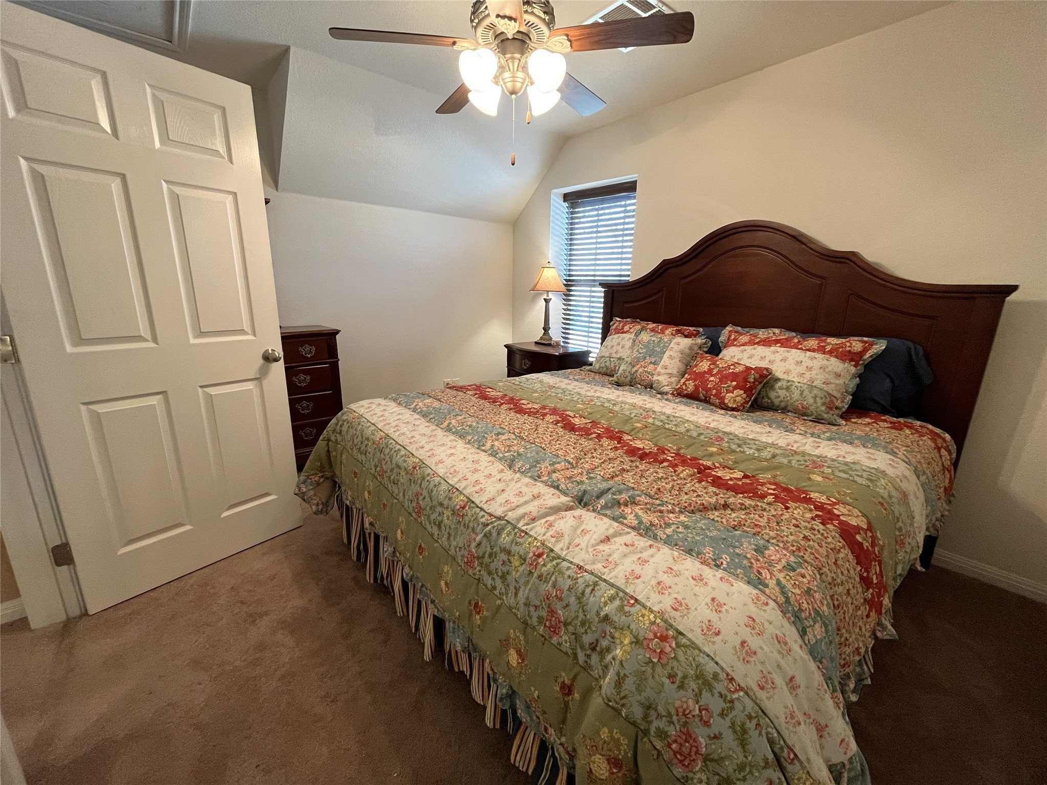 19846 Post Oak Loop Thornton, TX 76687 - Photo 35 of 44 a bedroom with a bed and a chandelier