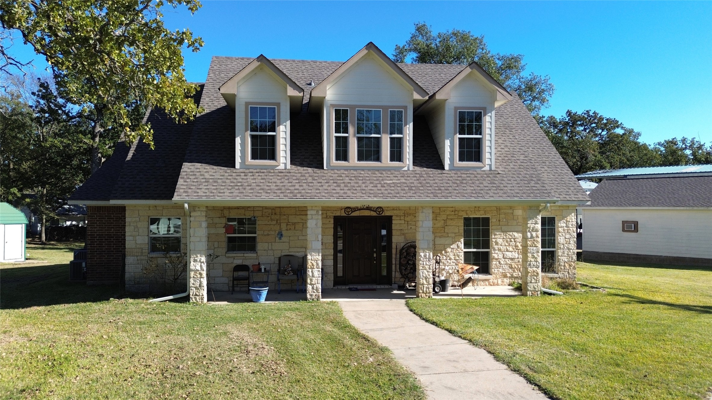 19846 Post Oak Loop Thornton, TX 76687 - Photo 39 of 44 a front view of a house with a yard