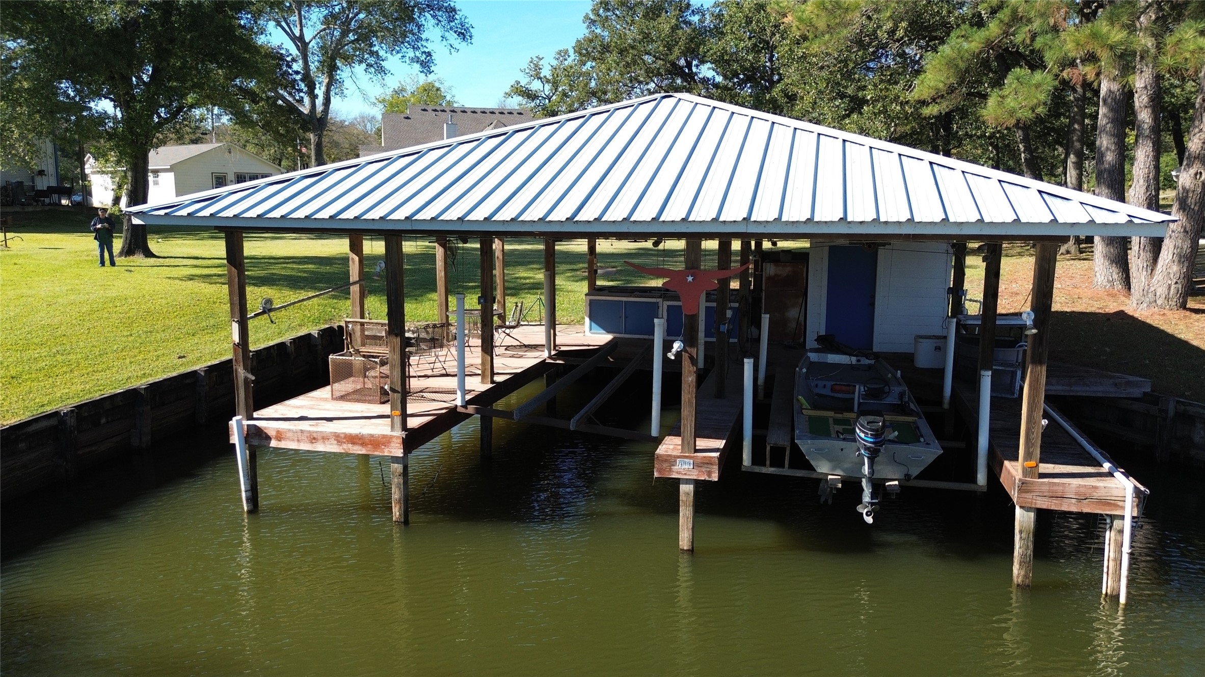 19846 Post Oak Loop Thornton, TX 76687 - Photo 7 of 44 a view of a patio with swimming pool table chairs and a yard