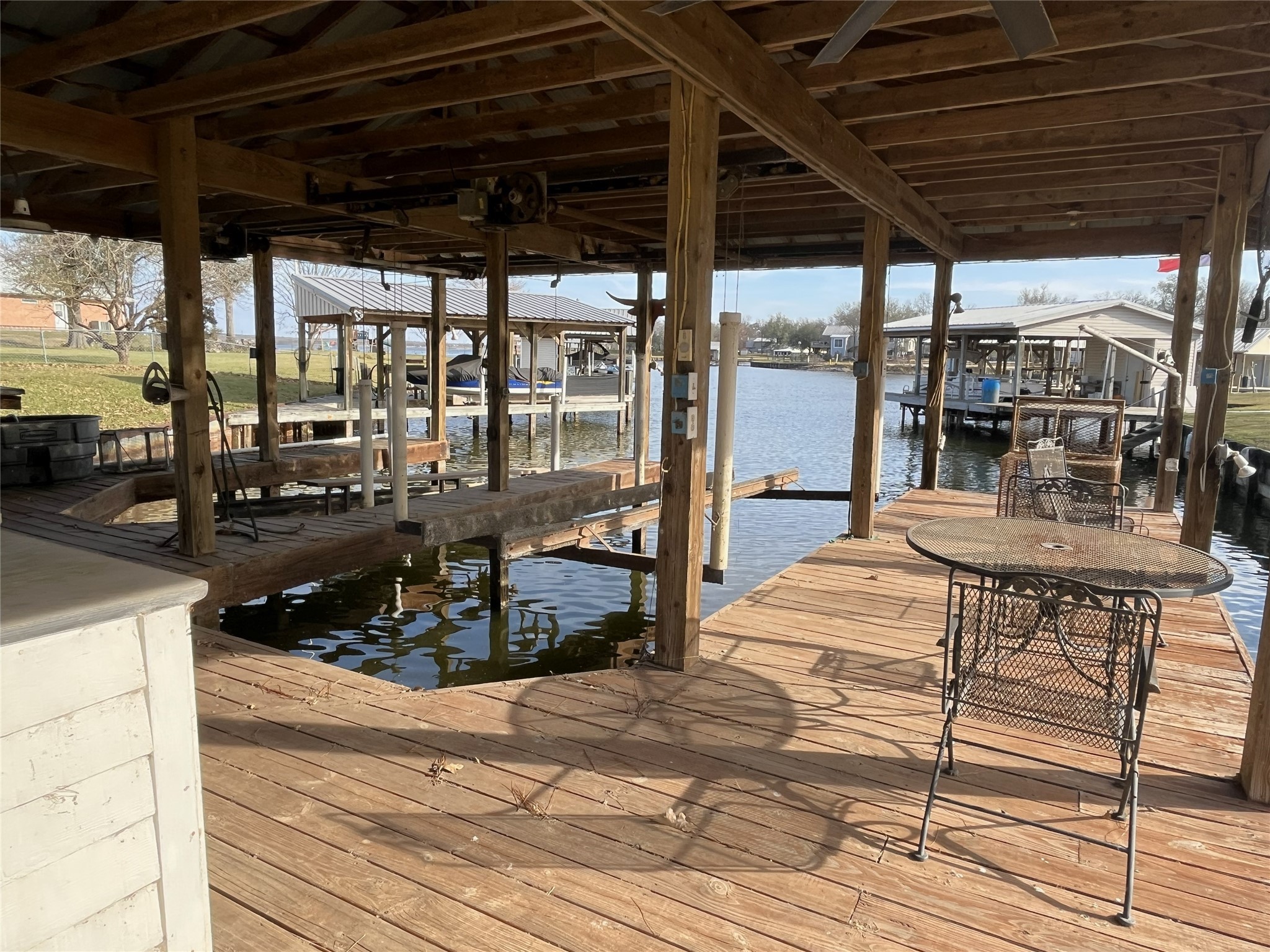 19846 Post Oak Loop Thornton, TX 76687 - Photo 8 of 44 a view of a patio with a table chairs and wooden floor