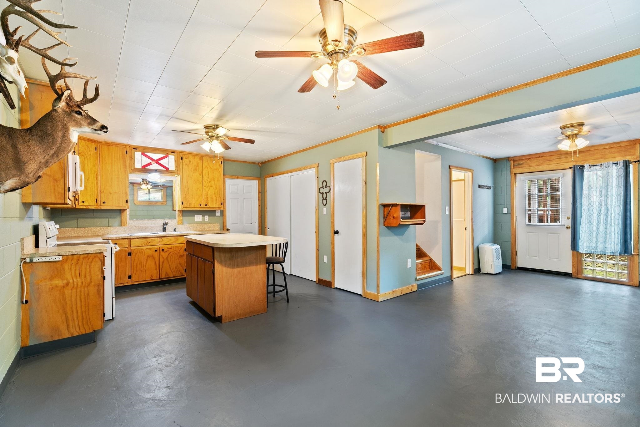14 Lee Circle Daphne, AL 36527 - Photo 49 of 83 Kitchen with sink, a center island, stove, and ceiling fan