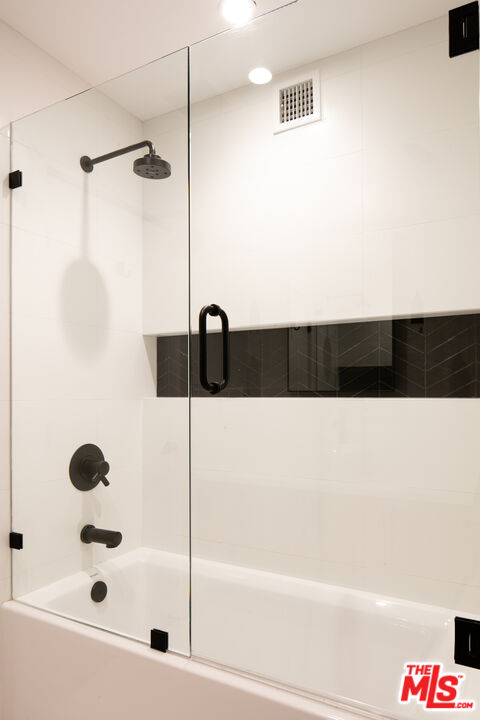 2811 3rd Street, Unit 1 Santa Monica, CA 90405 - Photo 11 of 21 a bathroom with a bathtub and a shower