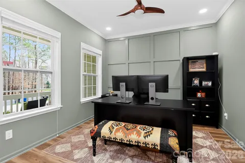 a bedroom with a bed and a table