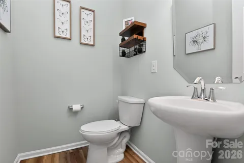 a bathroom with a toilet and a sink