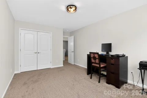 a view of workspace with lounge chair