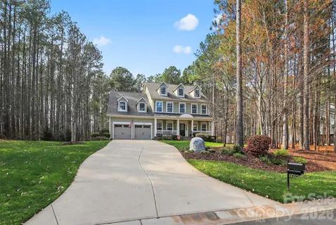a view of a street with sign board