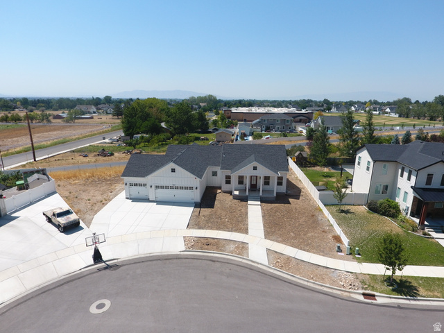 1257 North 1350th Street East Mapleton, UT 84664 - Photo 29 of 31 Contemporary single-story residence with a dark shingle roof and white siding