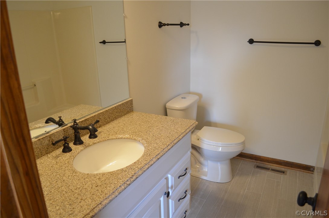 2100 Chemin Road Petersburg, VA 23805 - Photo 5 of 7 hall bath, new tile floor, vanity, granite tops, l