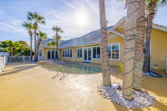 a view of house with outdoor seating