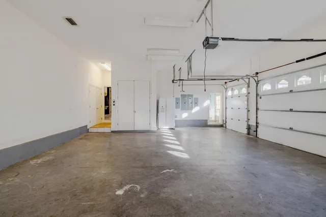 a front view of a house with a garage