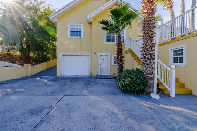 a kitchen with a sink cabinets and utility room