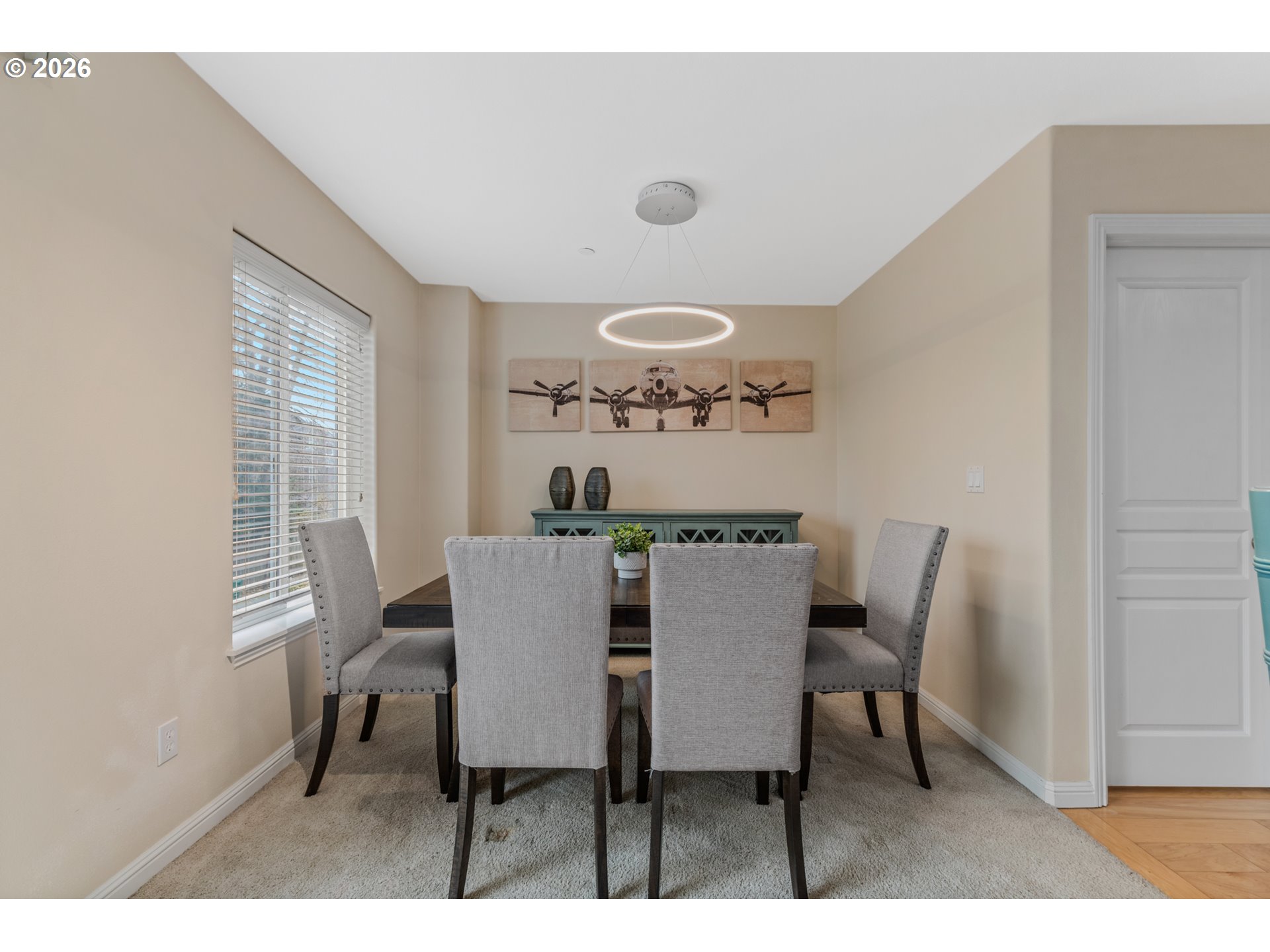 2924 Southwest Tranquility Terrace Beaverton, OR 97003 - Photo 12 of 39 a view of a dining room with furniture and a window