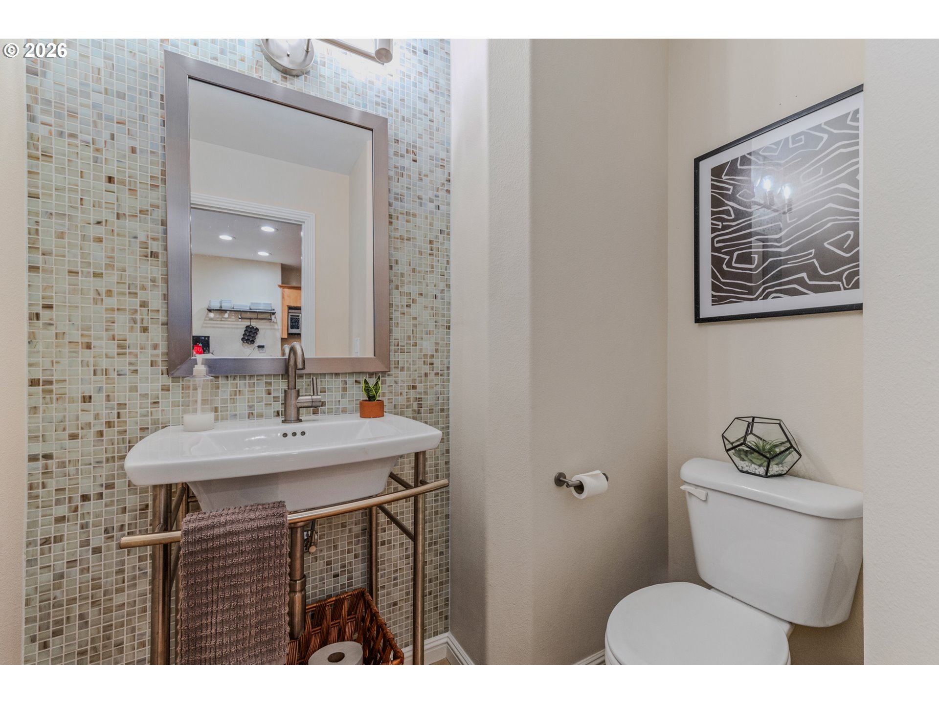 2924 Southwest Tranquility Terrace Beaverton, OR 97003 - Photo 17 of 39 a bathroom with a toilet a sink and mirror