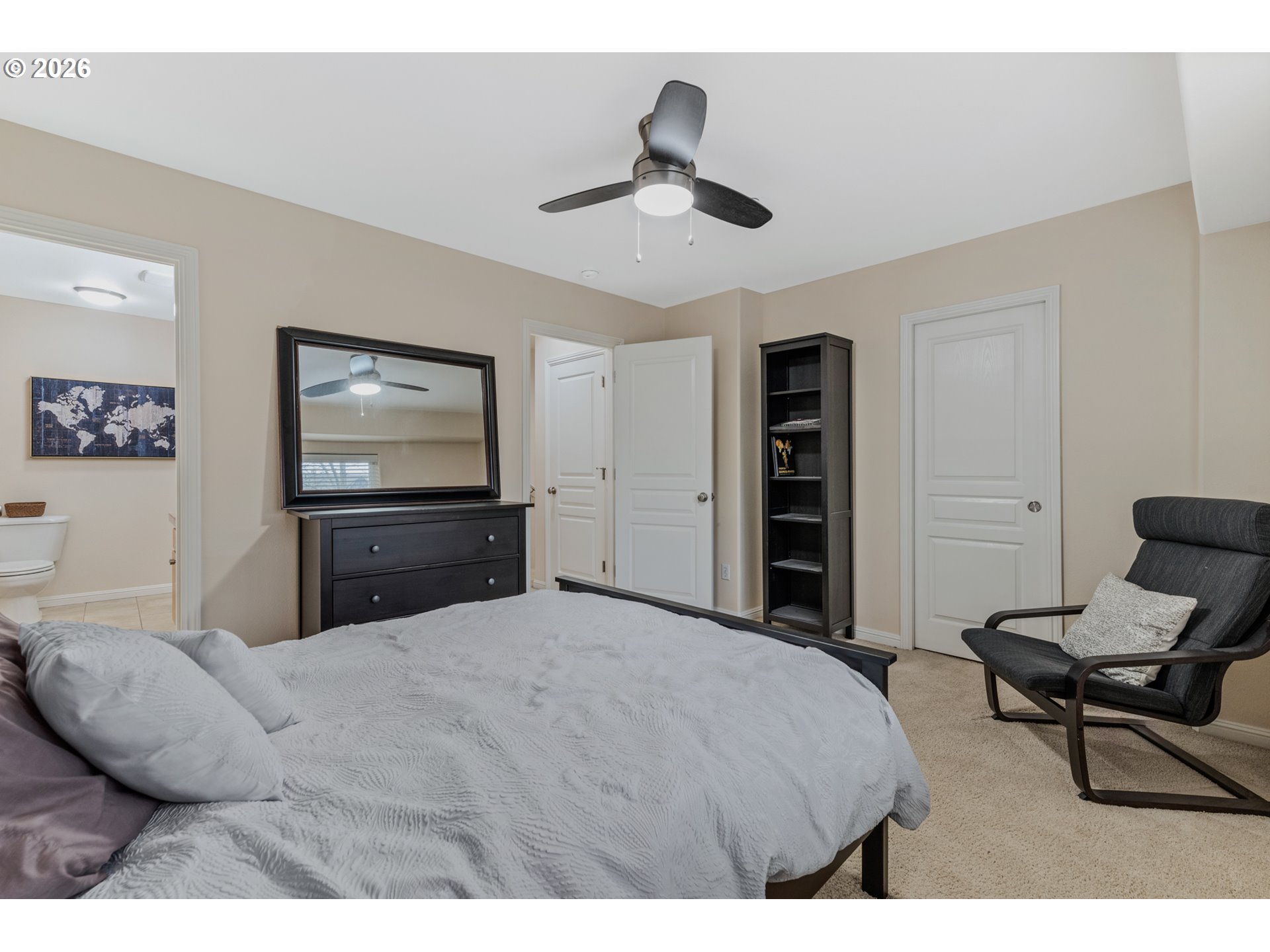 2924 Southwest Tranquility Terrace Beaverton, OR 97003 - Photo 20 of 39 a bedroom with a bed and a television