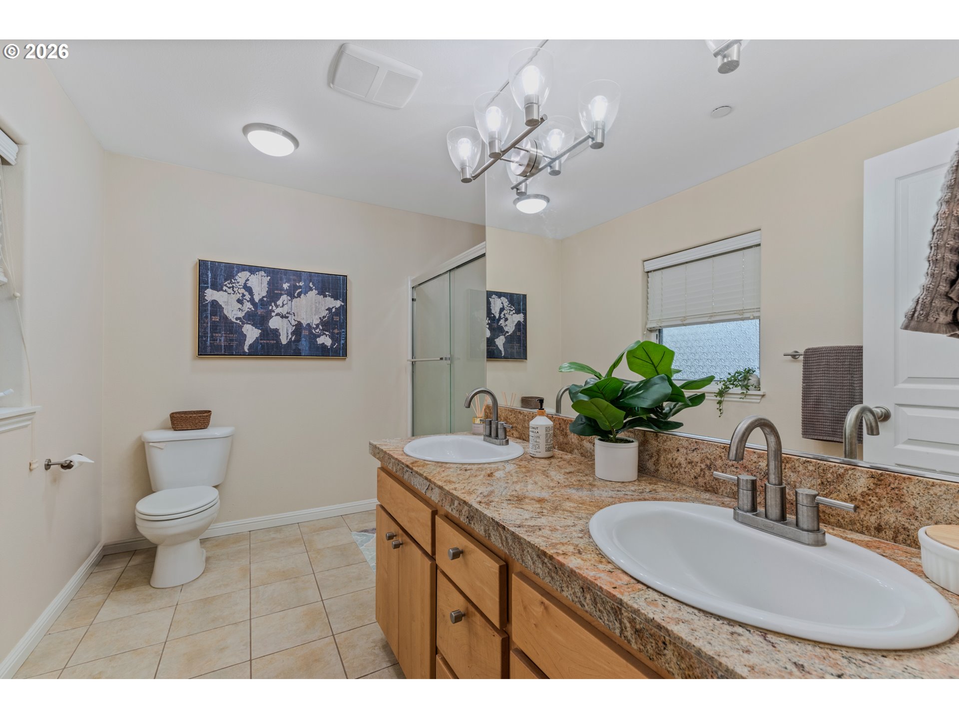 2924 Southwest Tranquility Terrace Beaverton, OR 97003 - Photo 21 of 39 a bathroom with a granite countertop sink a toilet and a mirror