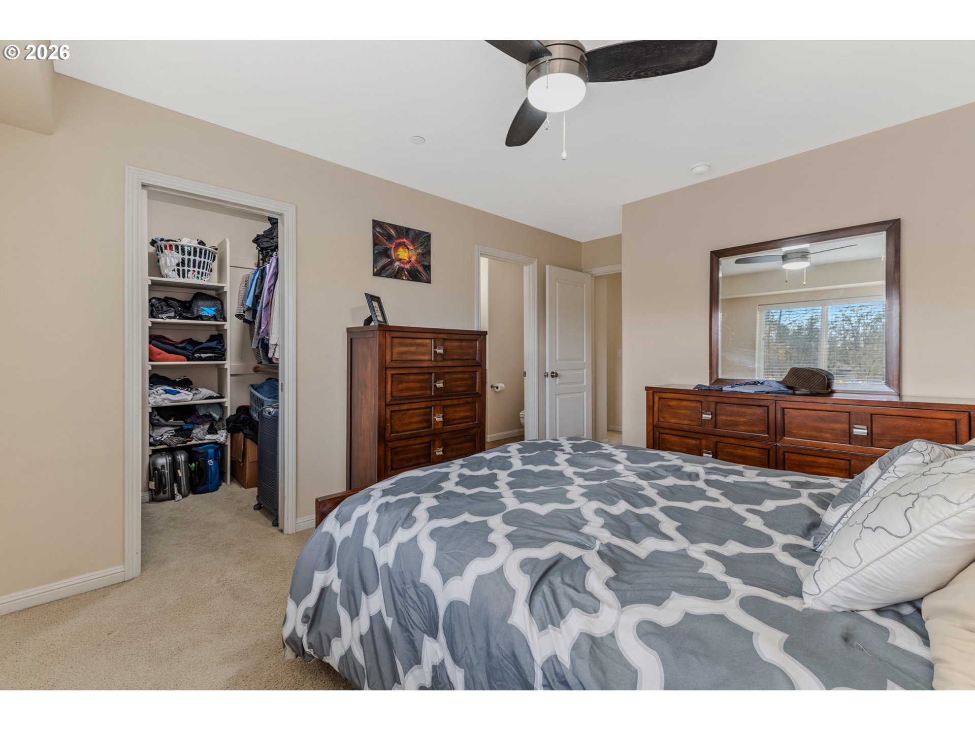 2924 Southwest Tranquility Terrace Beaverton, OR 97003 - Photo 27 of 39 a bedroom with a bed and a television