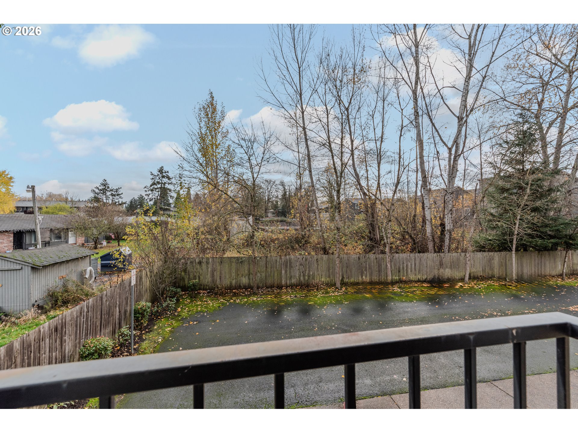 2924 Southwest Tranquility Terrace Beaverton, OR 97003 - Photo 34 of 39 a view of a lake from a balcony