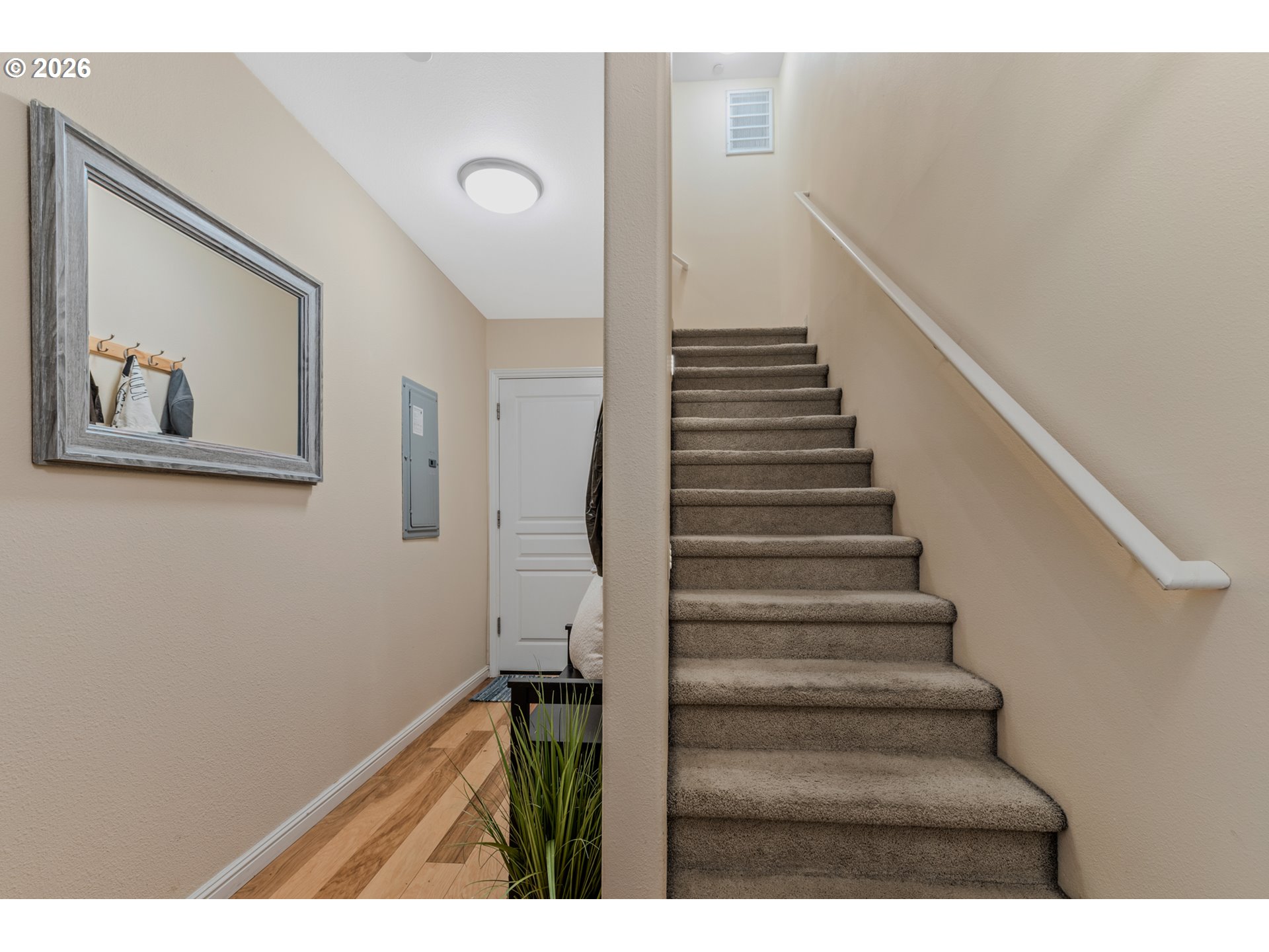 2924 Southwest Tranquility Terrace Beaverton, OR 97003 - Photo 5 of 39 a view of entryway with wooden floor