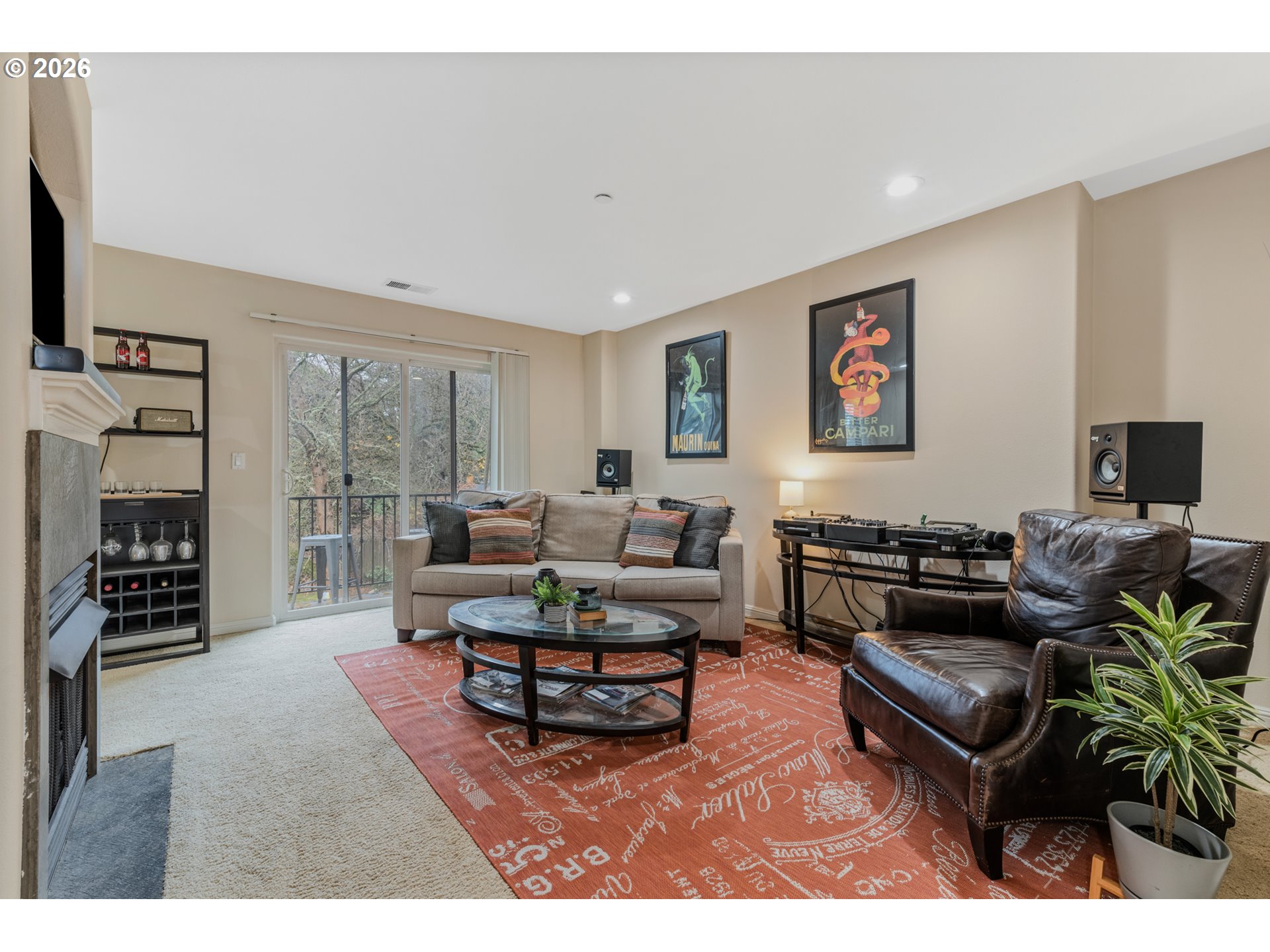 2924 Southwest Tranquility Terrace Beaverton, OR 97003 - Photo 6 of 39 a living room with furniture a flat screen tv and a window