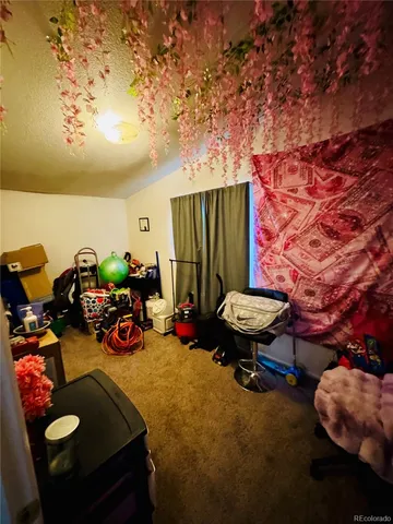 a bathroom with a sink a toilet a mirror and shower