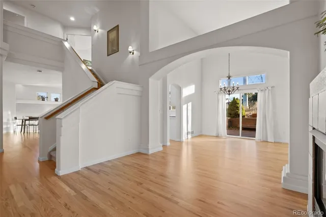 a view of an entryway with wooden floor