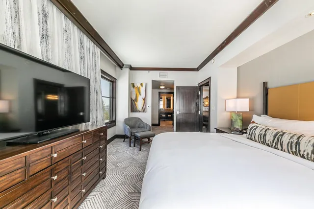 a bathroom with a tub and a mirror