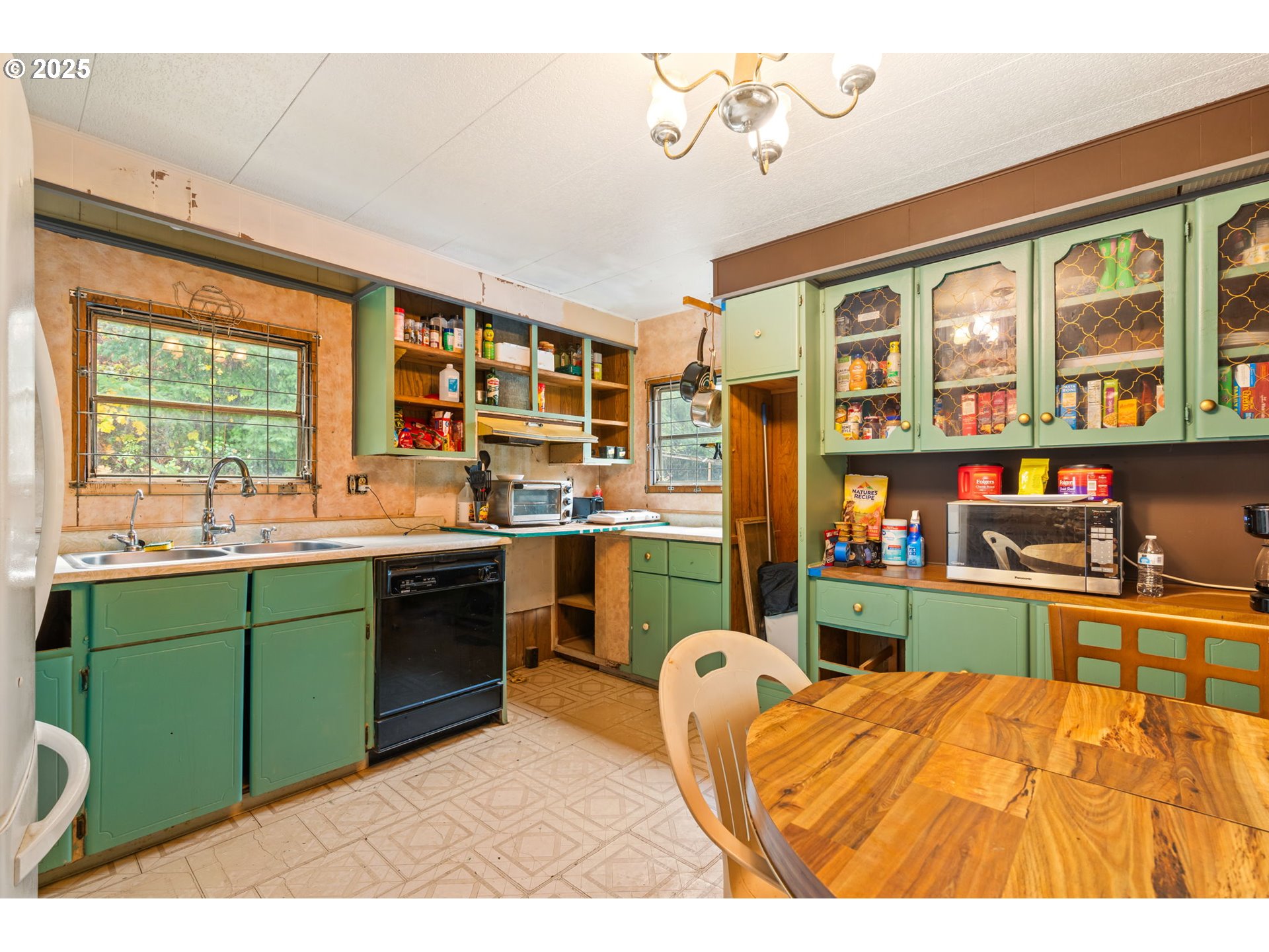 1586 King Road Winlock, WA 98596 - Photo 15 of 31 a bedroom with a bed dresser and a large window