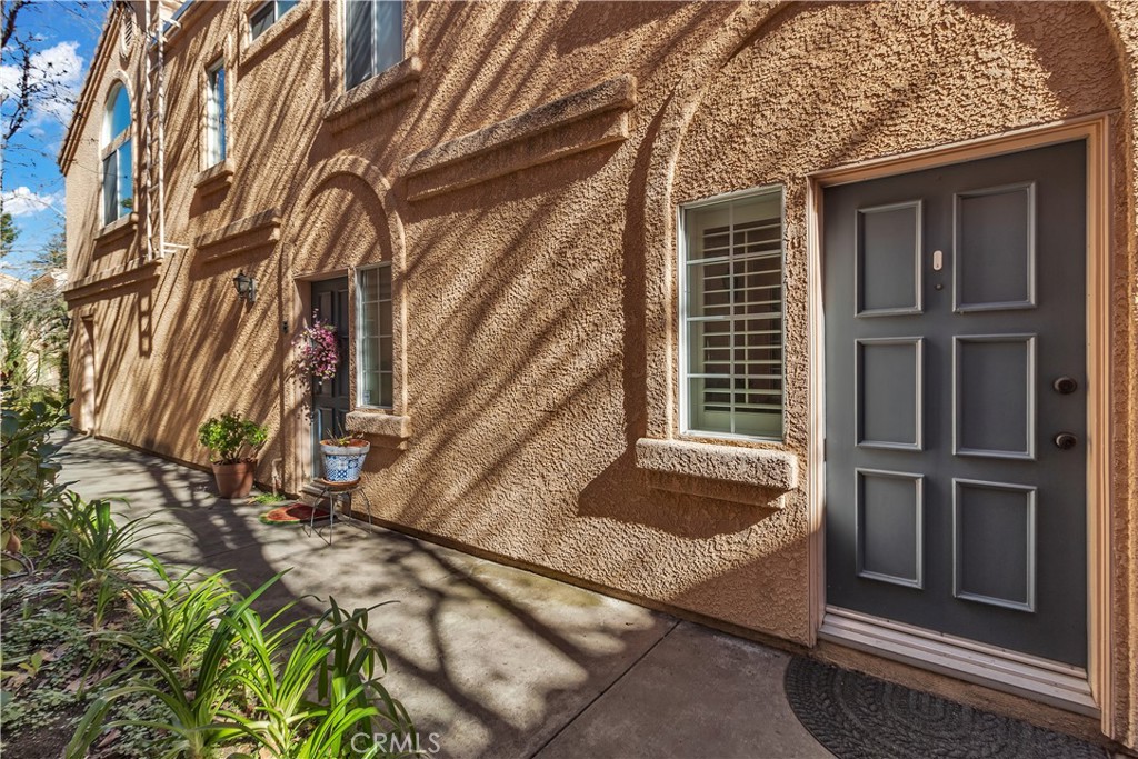 25144 Steinbeck Avenue, Unit F Stevenson Ranch, CA 91381 - Photo 1 of 26